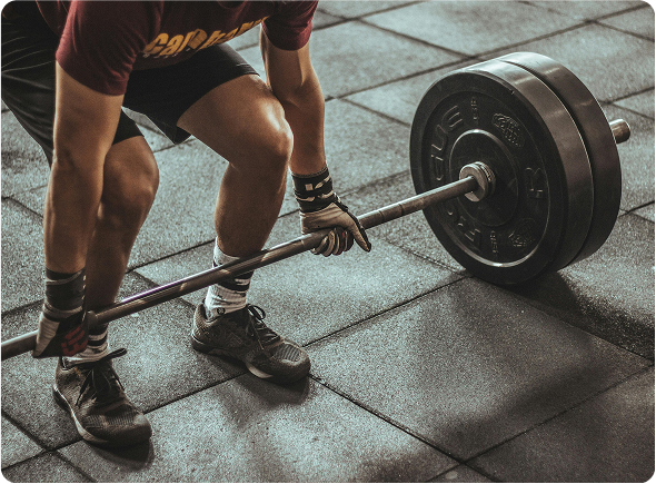 Person deadlifting