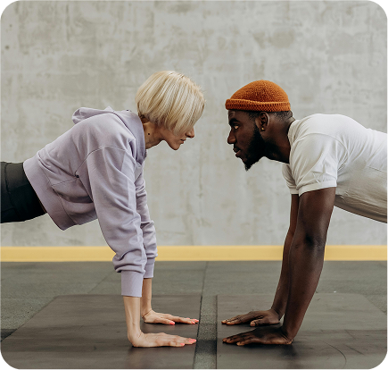 Two people doing pushups